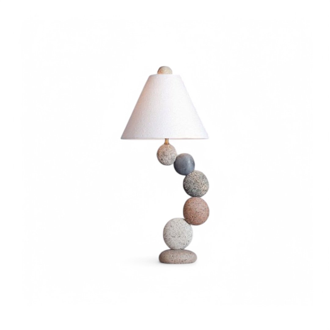 Elevate your garden ambiance with our handcrafted Riverstone Garden Lamp, made from stacked river stones and standing 35 cm tall. Lightweight, eco-friendly, and customizable to match your landscape.